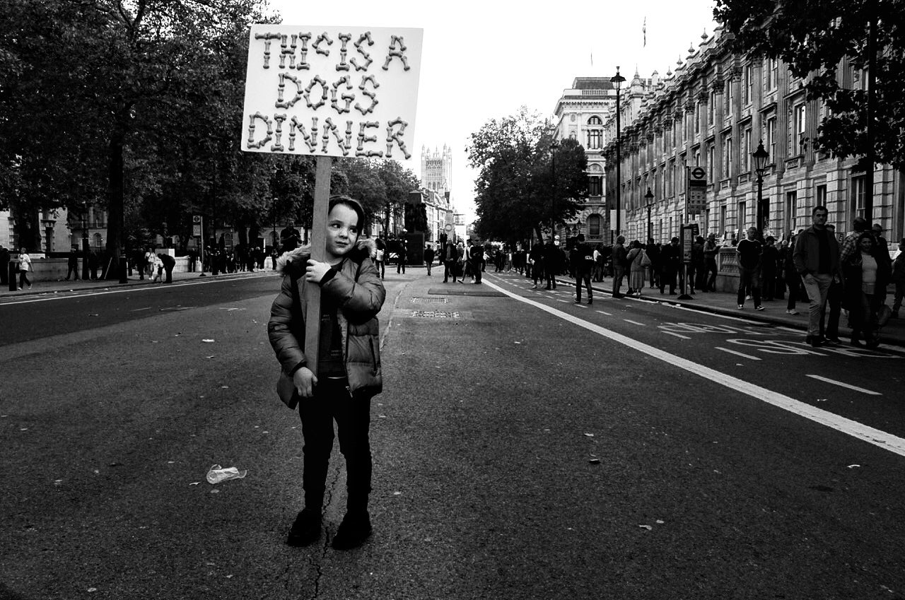 Child with anti-Brexit banner at the People’s Vote march in London