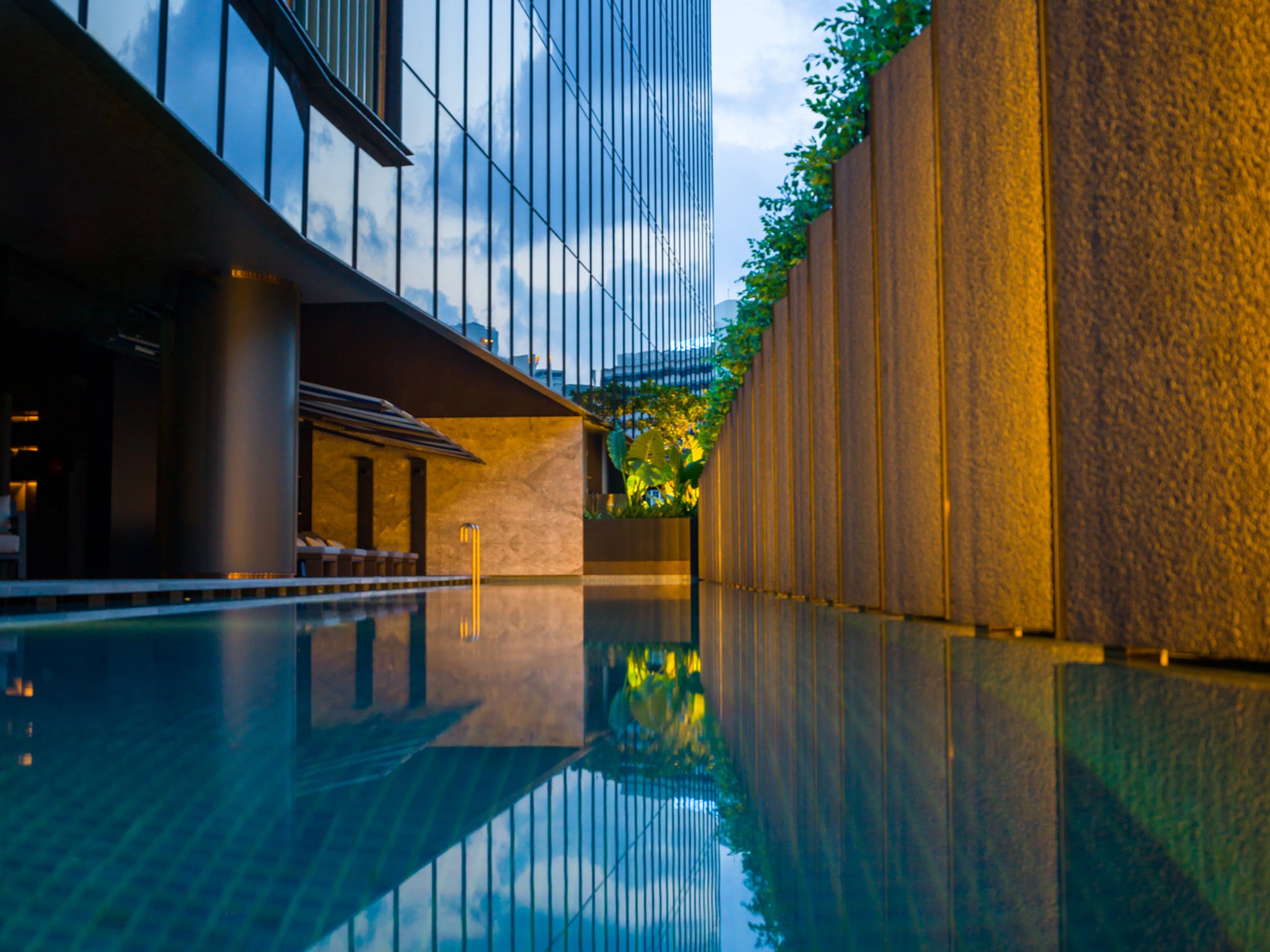 The outdoor swimming pool at St. Regis Singapore