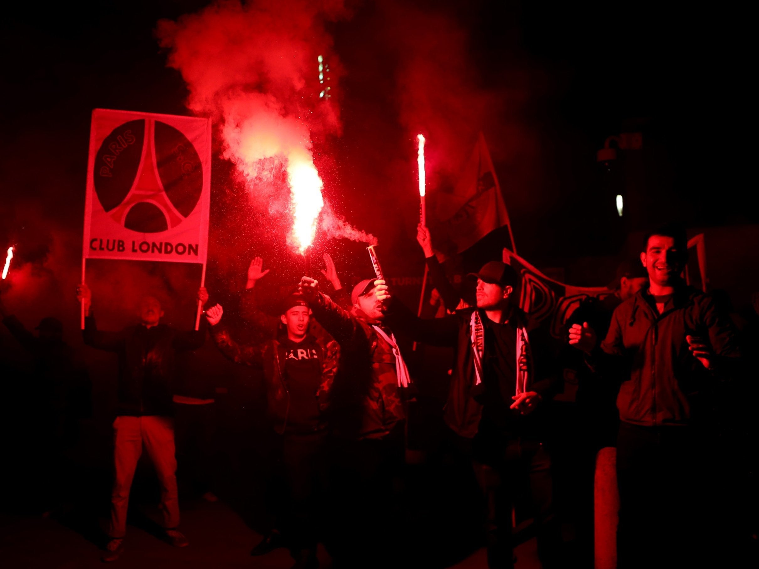 PSG fans light flares and smoke bombs outside Kingsmeadow during Chelsea Women and Paris Saint-Germain