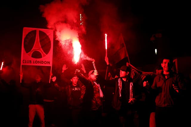 PSG fans light flares and smoke bombs outside Kingsmeadow during Chelsea Women and Paris Saint-Germain