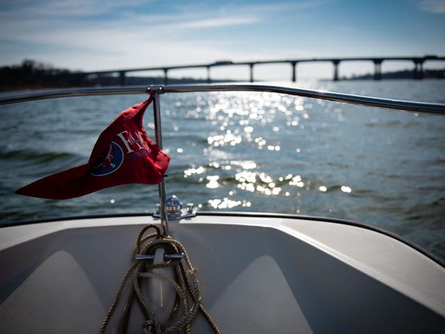 First Light, a boat belonging to the Chesapeake Bay Foundation, heads toward the US 50 bridge on the Severn River in Arnold