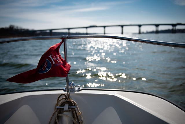 First Light, a boat belonging to the Chesapeake Bay Foundation, heads toward the US 50 bridge on the Severn River in Arnold