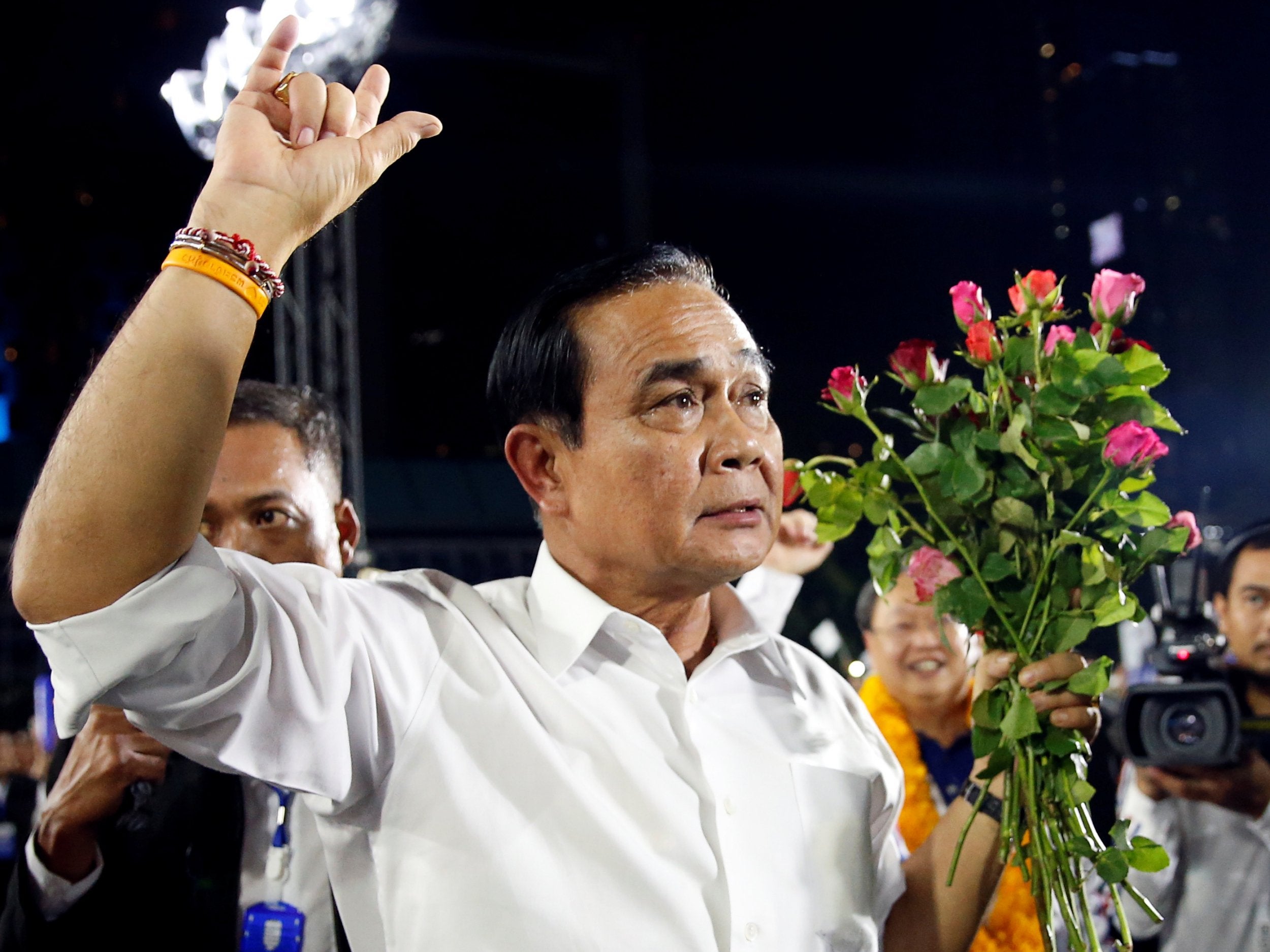 Thailand's prime minister and 2014 coup leader Prayuth Chan-ocha attends the Palang Pracharat party's final major rally in central Bangkok