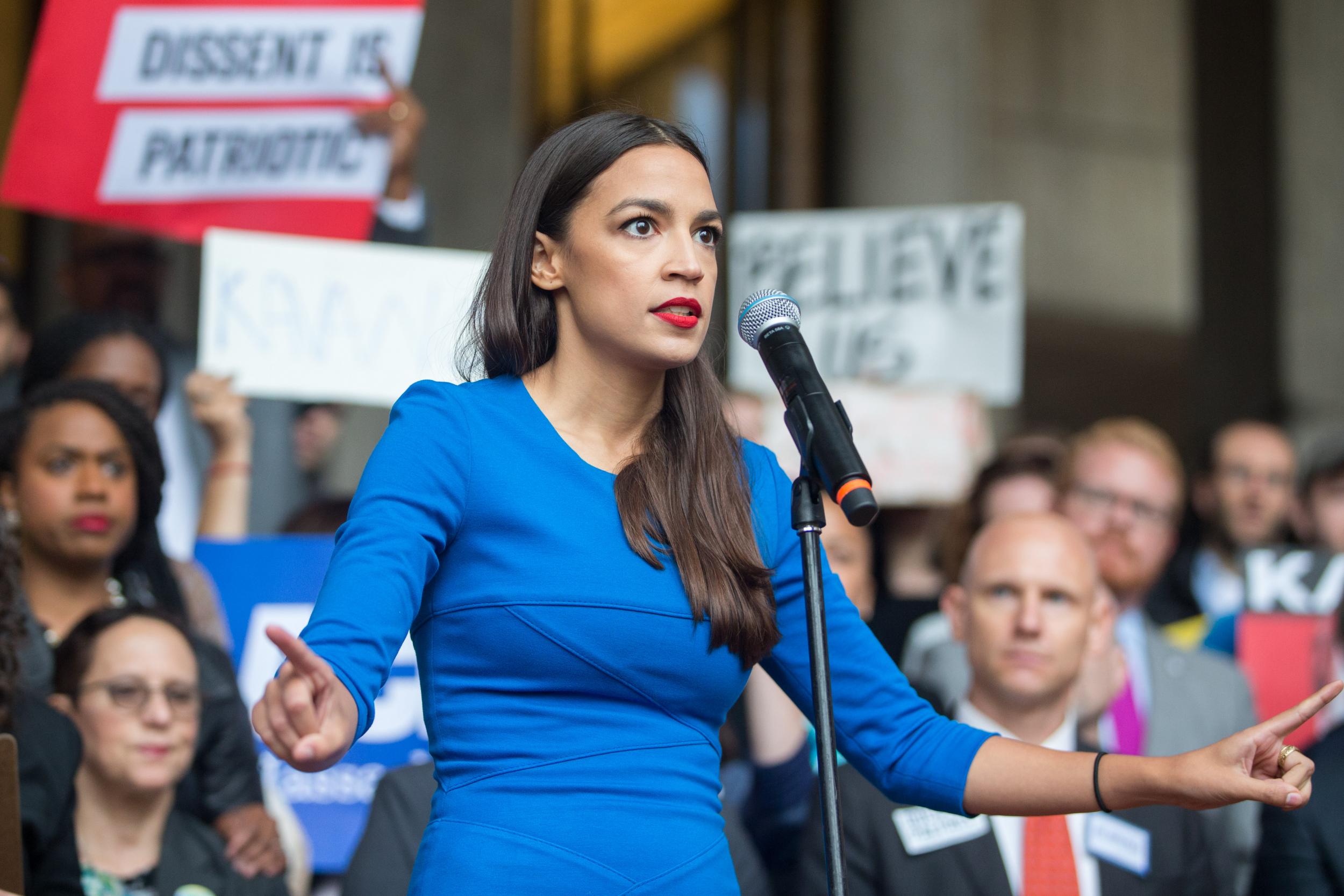 Alexandria Ocasio-Cortez speaks at a rally calling on Sen. Jeff Flake (R-AZ) to reject Judge Brett Kavanaugh's nomination to the Supreme Court on 1 October 2018 in Boston, Massachusetts