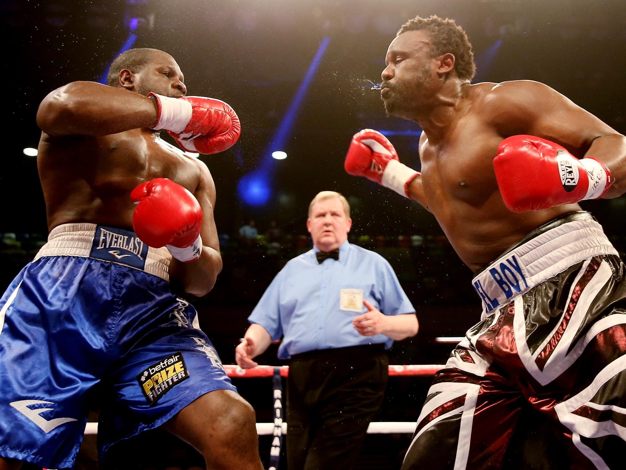 Kevin Johnson in action against Dereck Chisora during their 2014 fight