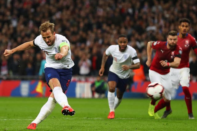 Harry Kane converts from the spot to double England’s lead (
