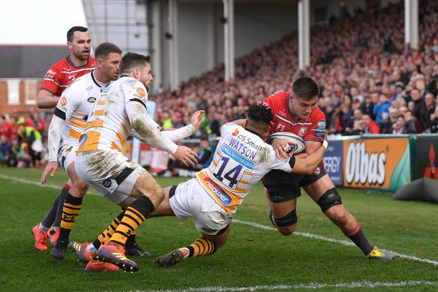 Jake Polledri dives in at the corner to score Gloucester's decisive third and final try
