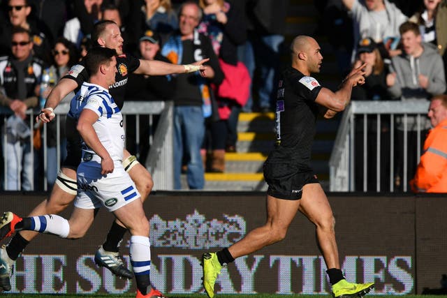 Olly Woodburn celebrates after scoring Exeter's third try of the match
