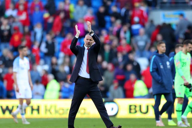 Ryan Giggs applauds the fans inside the Cardiff City Stadium after Wales beat Slovakia