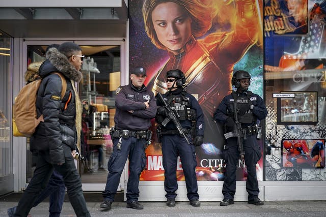 Members of the New York City Police (NYPD) Counter-terrorism unit patrol stand watch in Times Square 18, March 2019 in New York City.