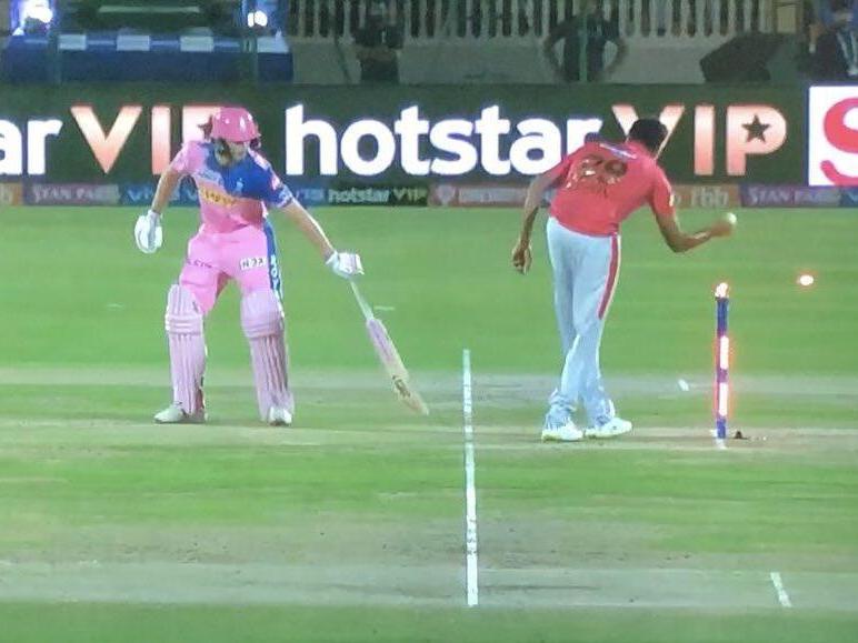 Jos Buttler is controversially run out by Ravi Ashwin