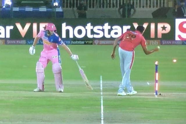 Jos Buttler is controversially run out by Ravi Ashwin