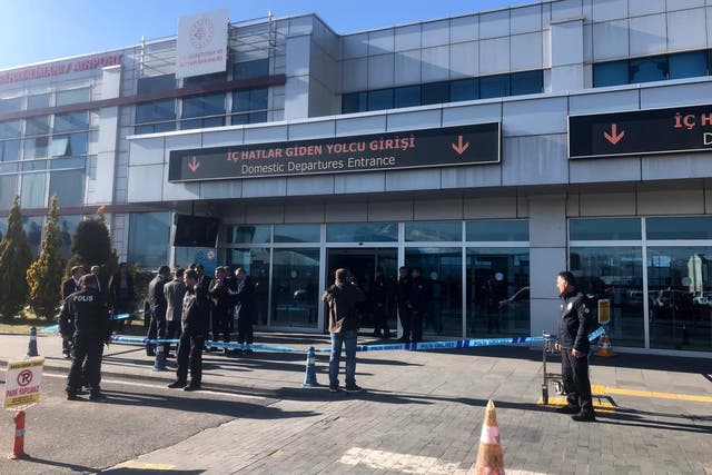 Turkish police secure the area in front of the Kayseri airport entrance in Kayseri, on Tuesday