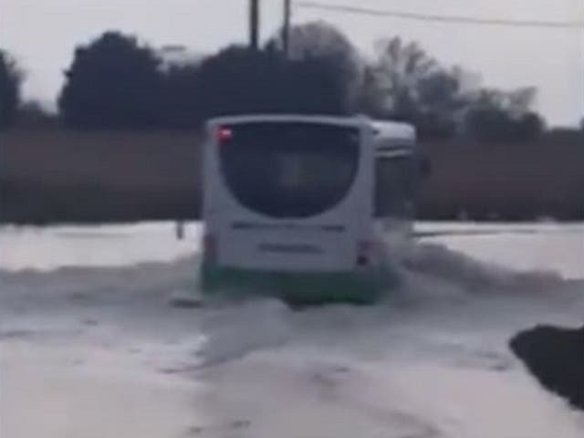 A bus had to be rescued after it drove into flood water at high tide and became stuck in a ditch at Wallasea Island, in Essex, on 23 March 2019.