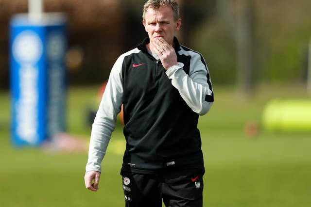 Mark McCall looks on during a training session