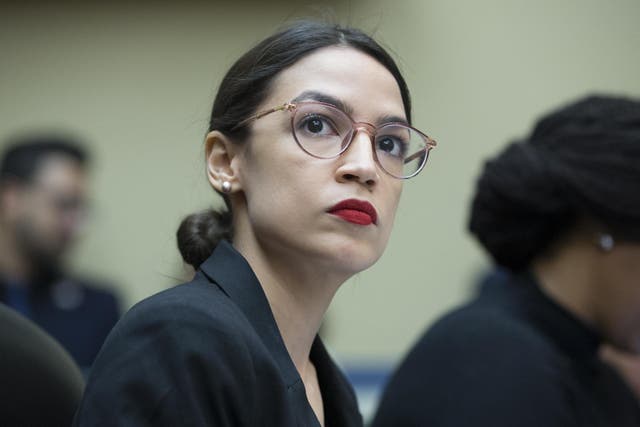 Alexandria Ocasio-Cortez attends a House Oversight and Reform Committee hearing on oversight of the Commerce Department