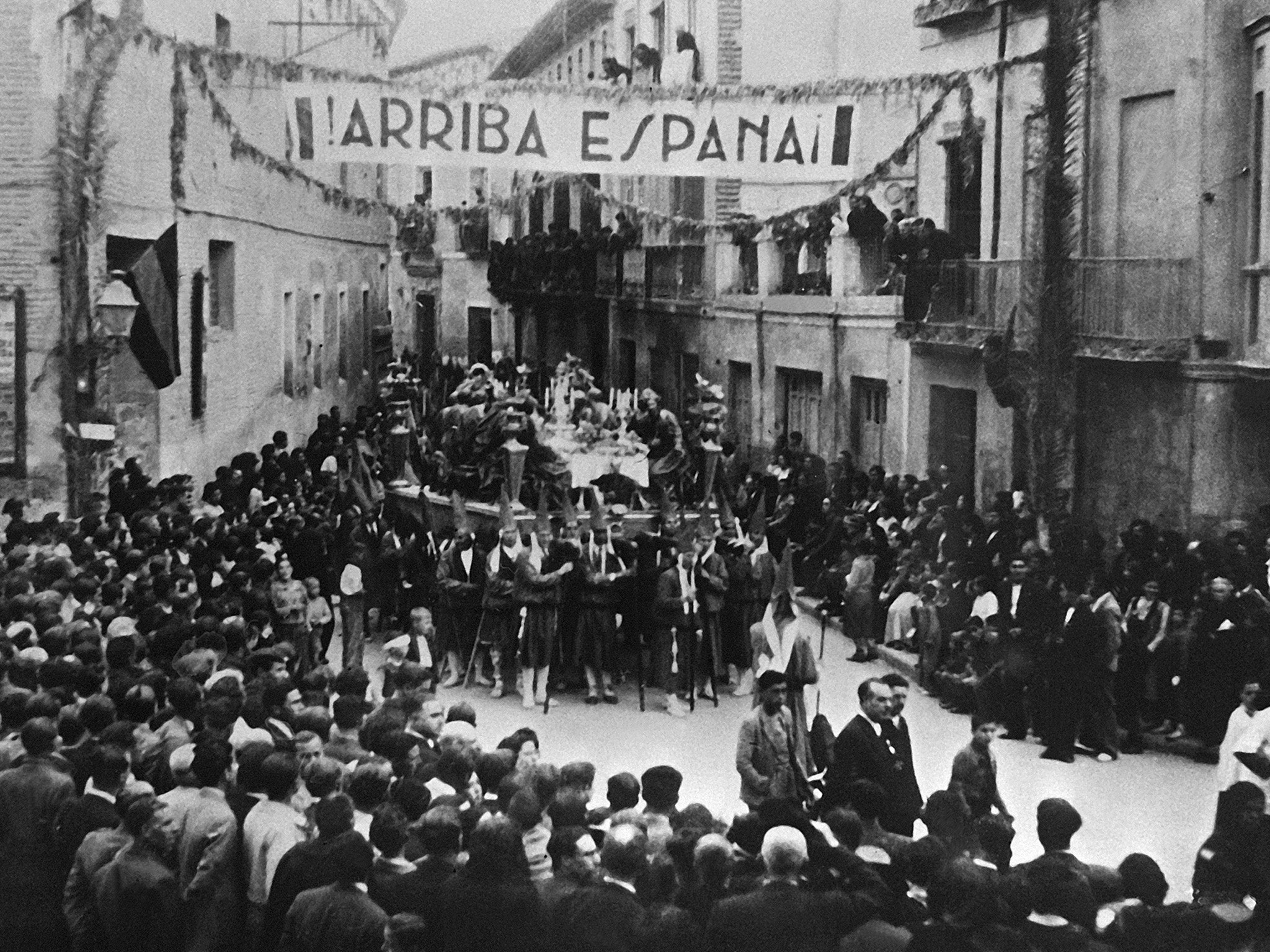 Pro-Franco crowds in Murcia, Spain, celebrate the end of the civil war in 1939