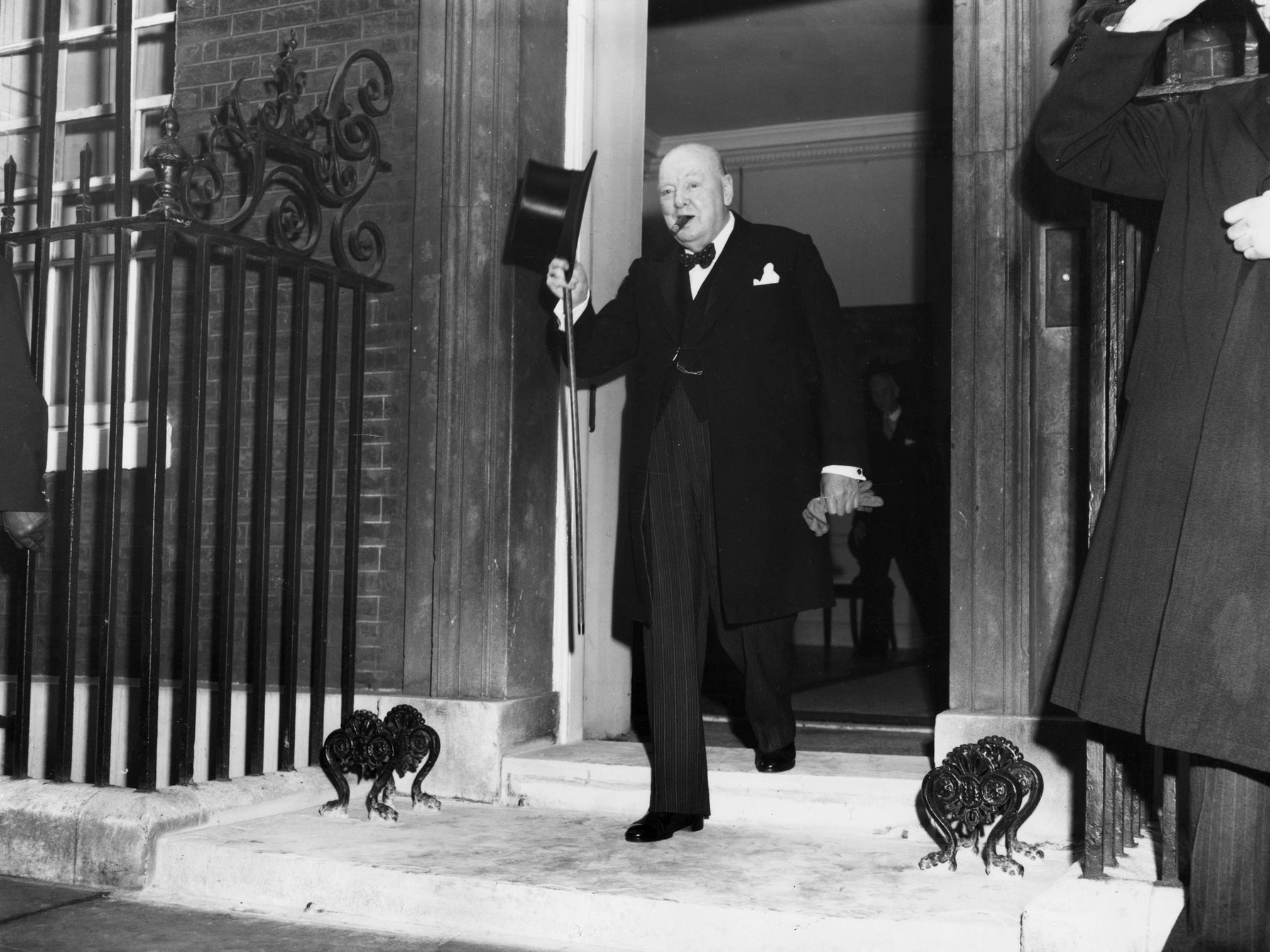 Winston Churchill leaves No 10 Downing Street to visit Queen Elizabeth II and tender his resignation on 5 April 1955 (Getty Images)