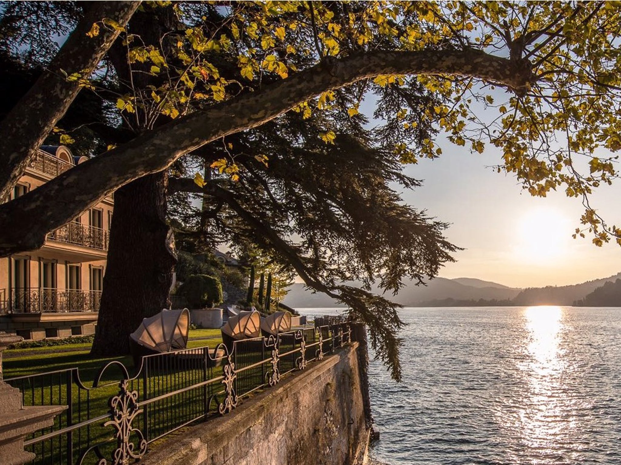 Float on a sundeck at this spot on Italy’s serene Lake Como