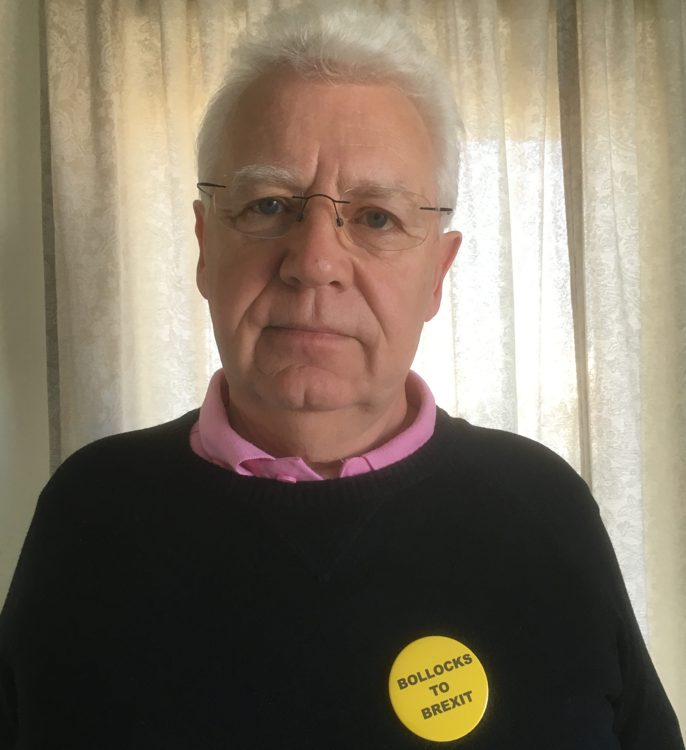 Peaceful protester: Eddie Brinsmead-Stockham wearing the 'offensive' badge