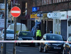 Man arrested after shopkeeper stabbed to death in London