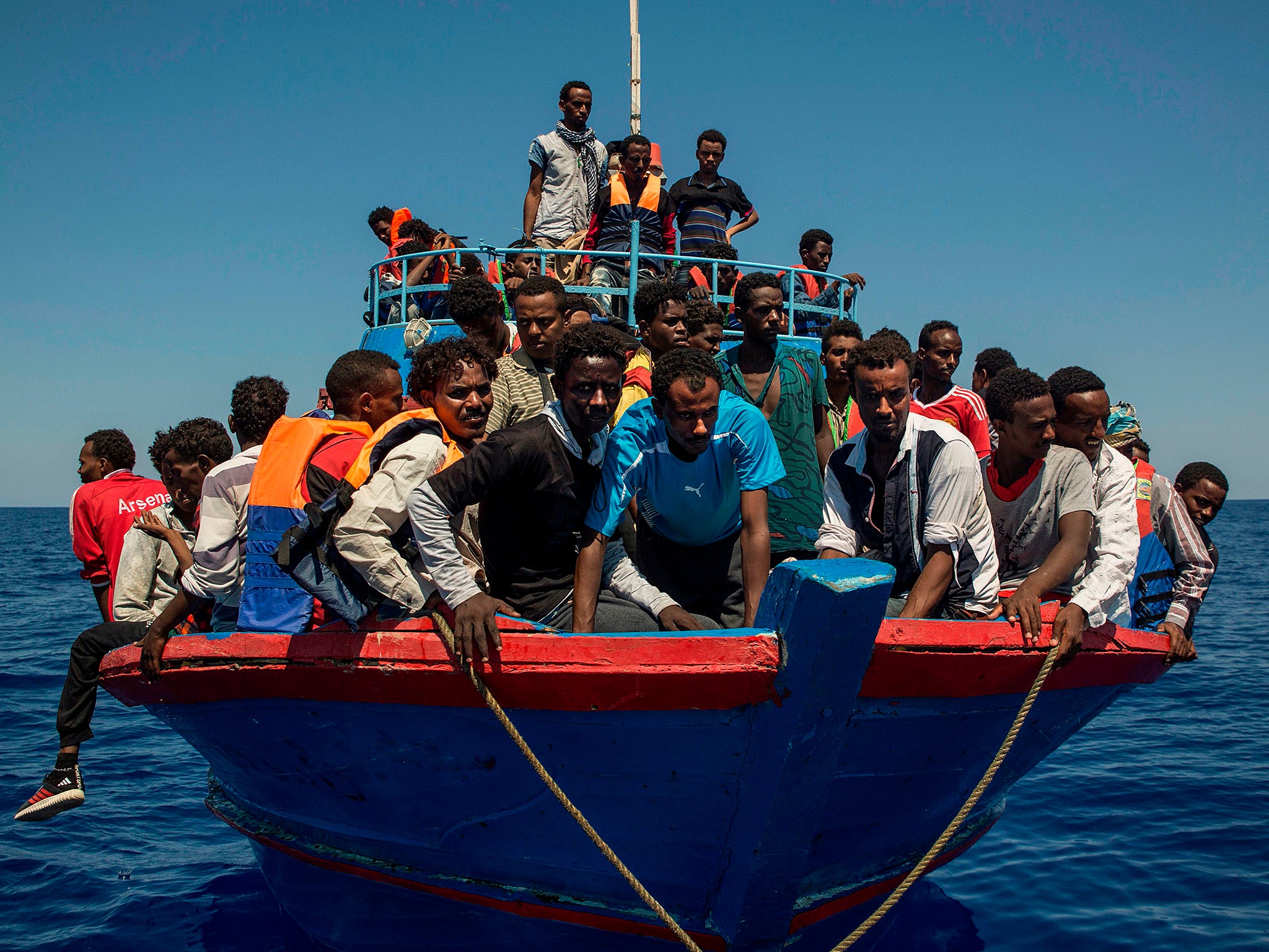 Migrant boat leaving Libyan coast in August 2017