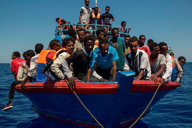 Migrant boat leaving Libyan coast in August 2017