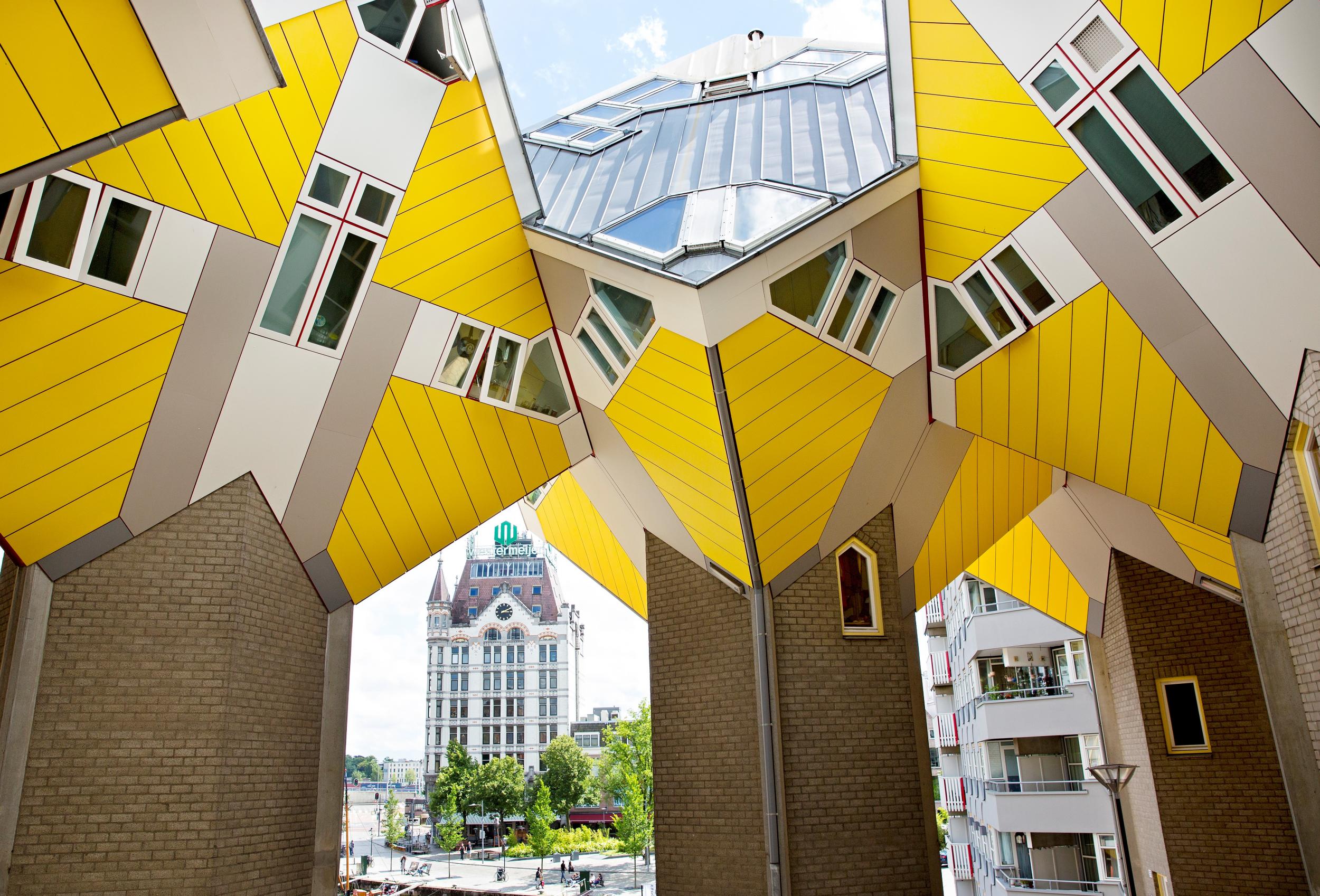 The banana-yellow cube houses