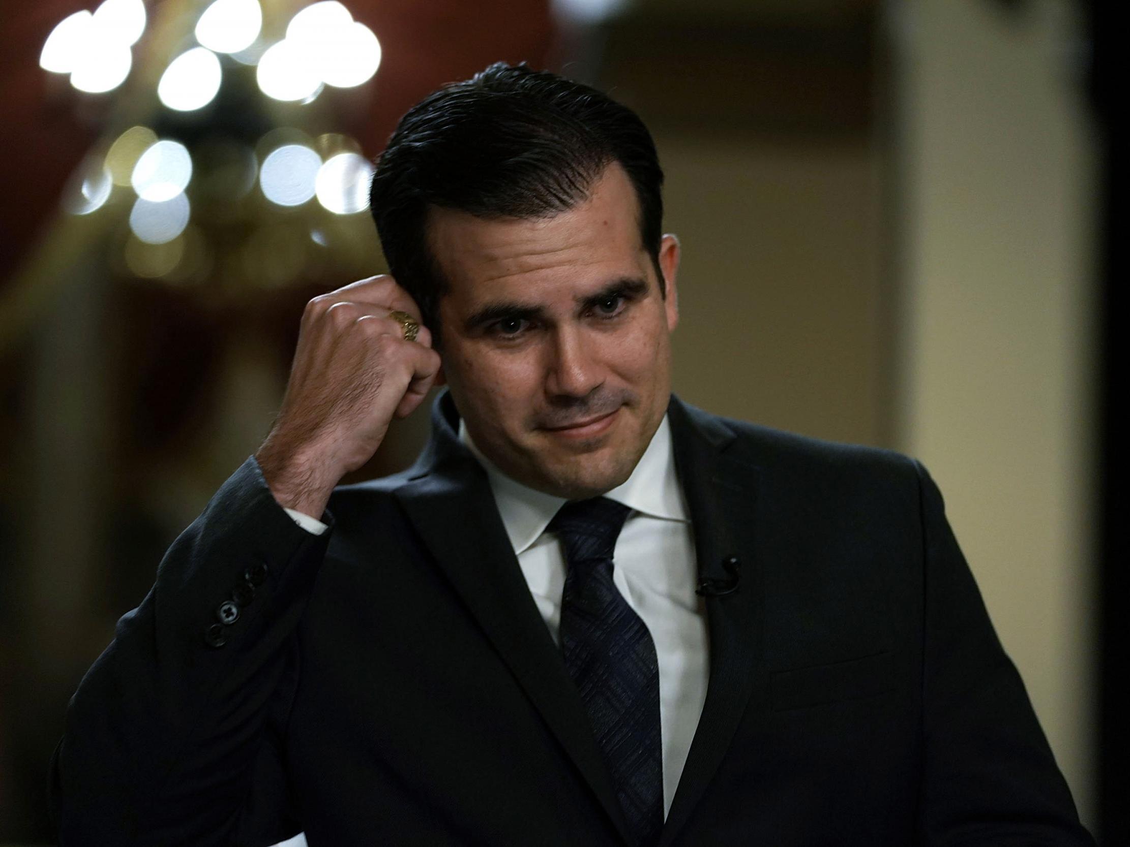 Puerto Rican Gov. Ricardo Rossello is interviewed by a TV channel after a House vote at the Capitol December 21, 2017 in Washington, DC. T