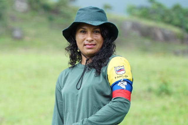Luz Marina, in the FARC uniform she used to wear, now works for the reintegration camp 