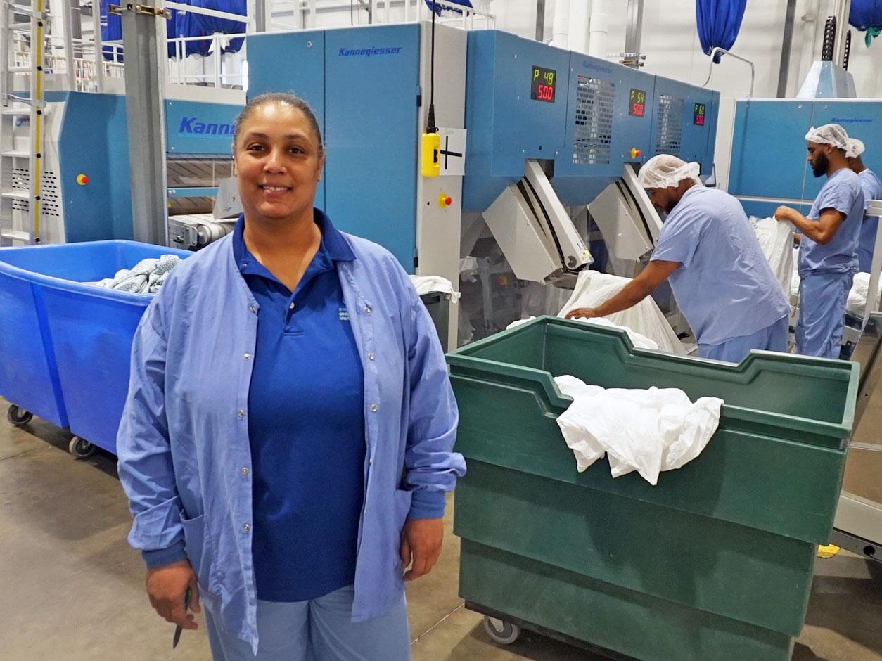 Tymika Thomas owns a share of Evergreen Cooperative Laundry