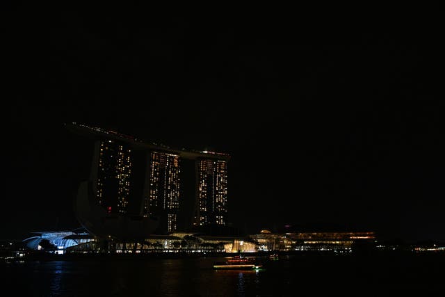 Marina Bay Sands hotel in Singapore with lights off for Earth Hour