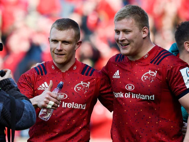 Keith Earls celebrates Munster's victory over Edinburgh with teammate John Ryan