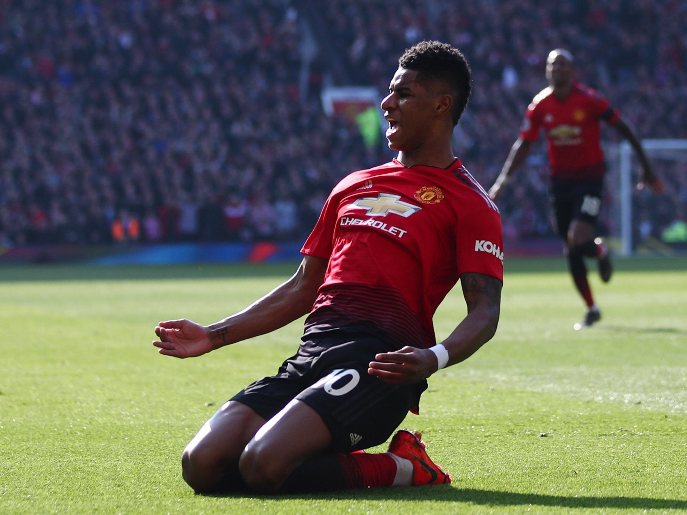 Marcus Rashford celebrates scoring the opening foal for Manchester United against Watford