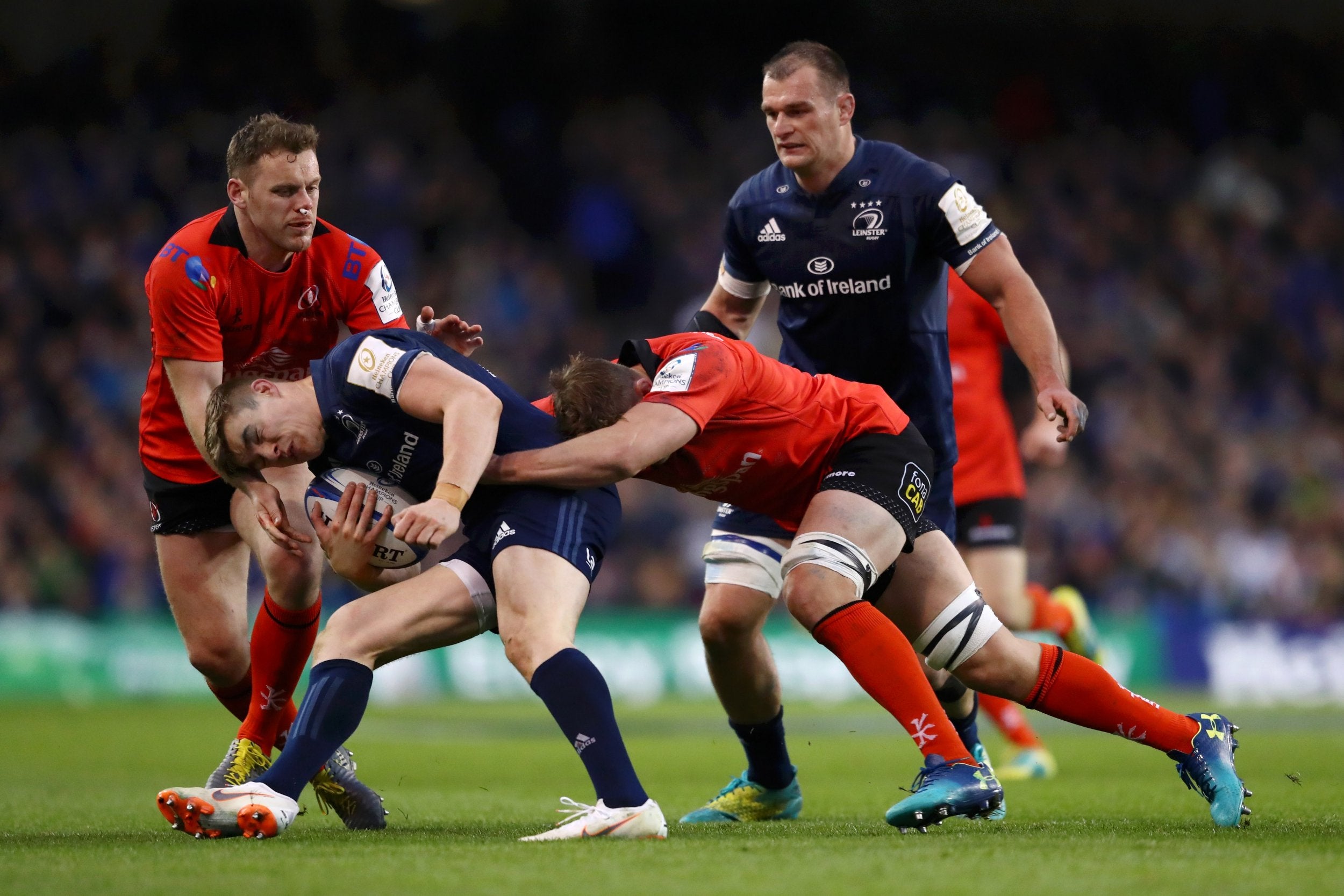 Michael Lowry gets hold of Gerry Ringrose as he heads into the tackle