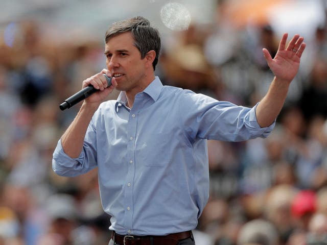 Democratic 2020 US presidential candidate Beto O'Rourke addresses his supporters at a kickoff rally on the streets of El Paso