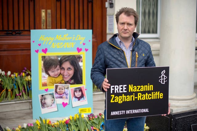 Richard Ratcliffe delivers a giant Mother's Day card and bunches of flowers to the steps of the Iranian embassy in London as he continues to campaign for his wife's release from prison