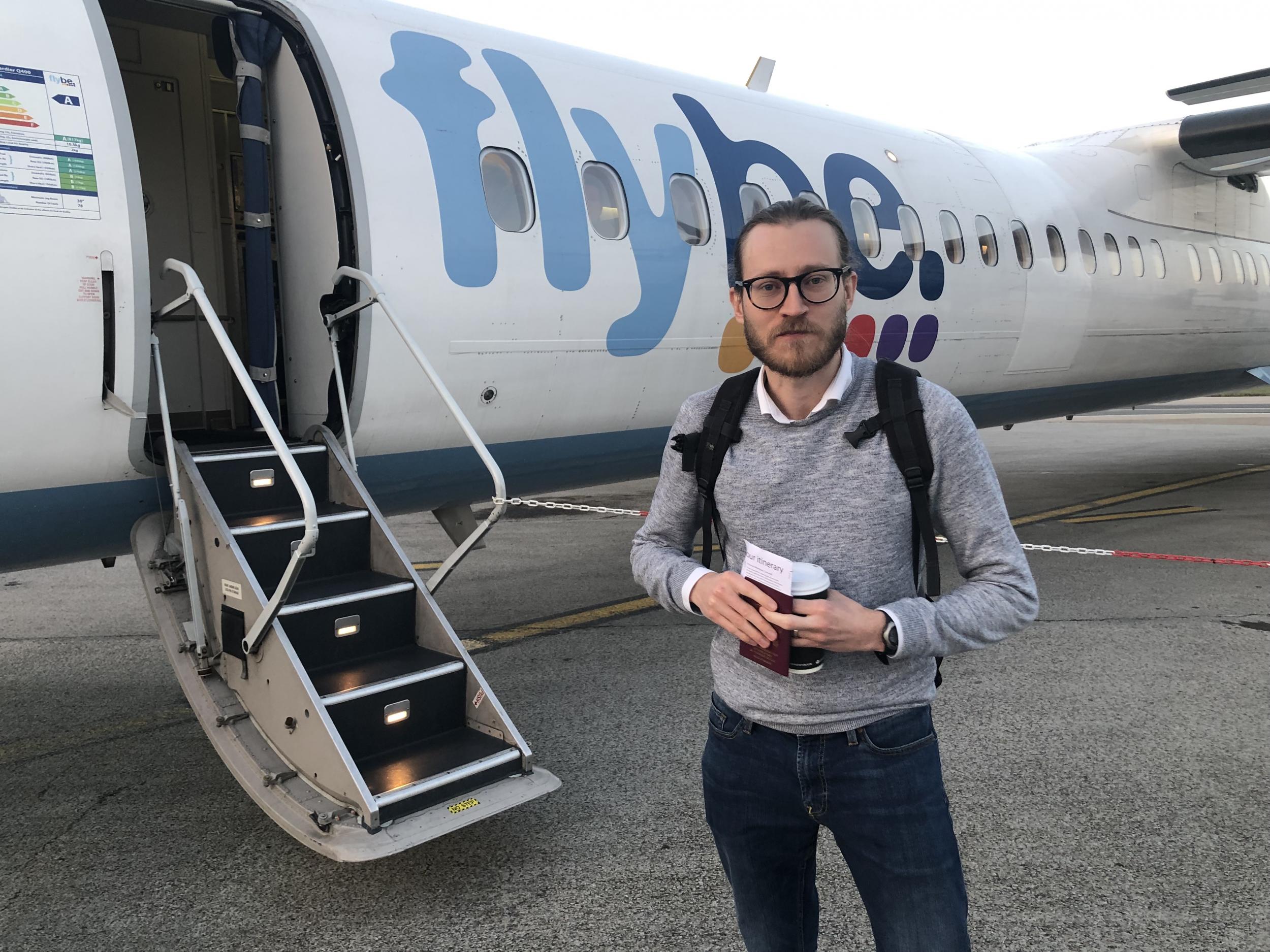 Pass go: Rich Bradley about to board the first Flybe departure from Newquay to Heathrow