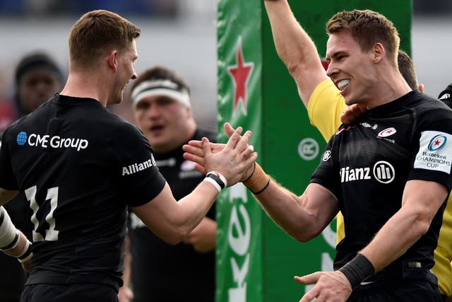 Liam Williams celebrates with David Strettle after scoring for Saracens against Glasgow