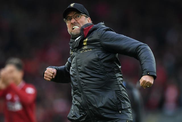 Jurgen Klopp punches the air in celebration at Liverpool's 2-1 win over Tottenham