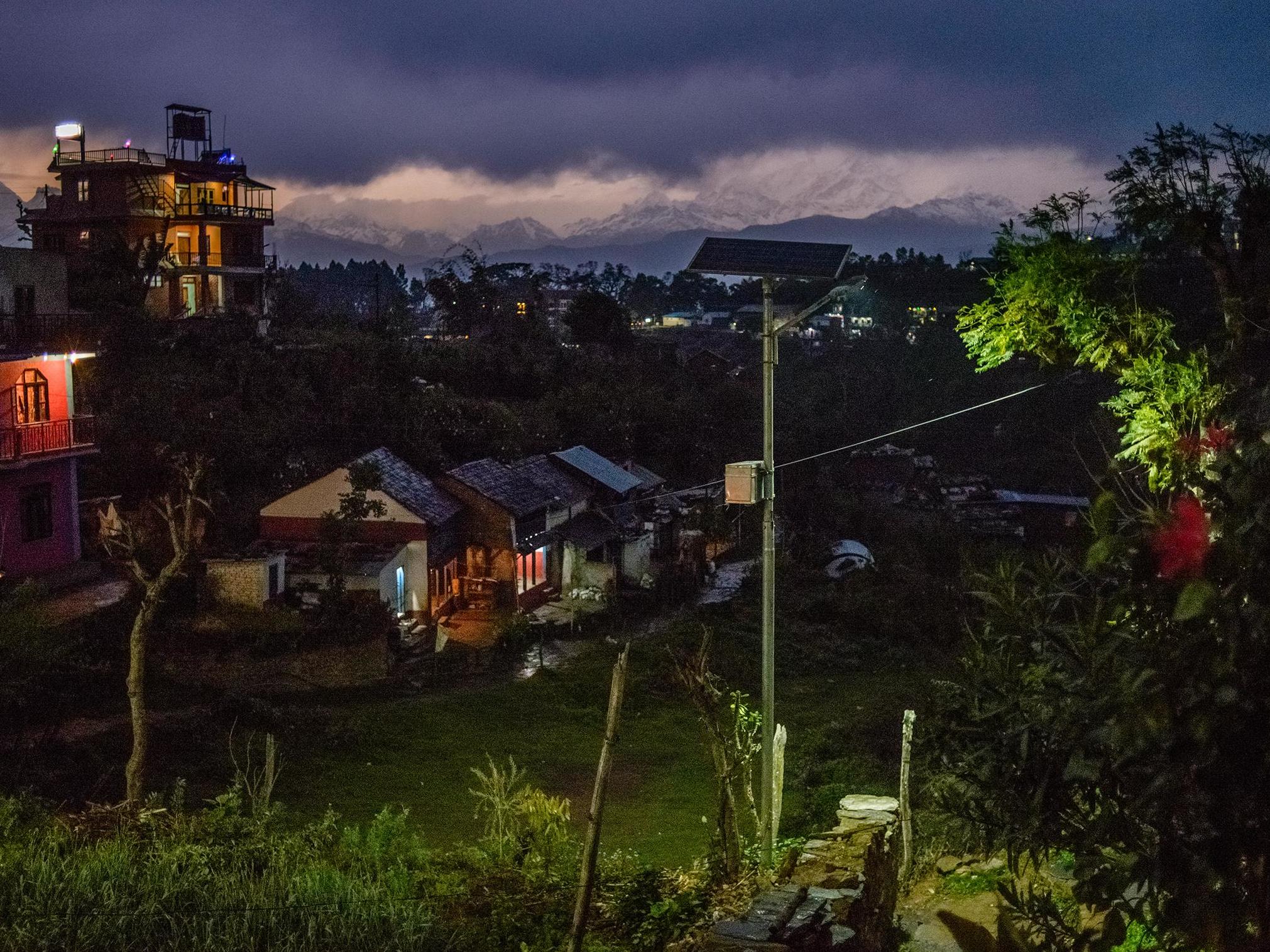 Himalayan mountain range shows behind the storm clouds in Bandipur, Nepal