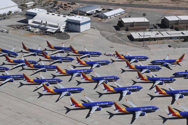 Southwest Airlines Boeing 737 MAX aircraft are parked on the tarmac after being grounded, at the Southern California Logistics Airport in Victorville, California on March 28, 2019