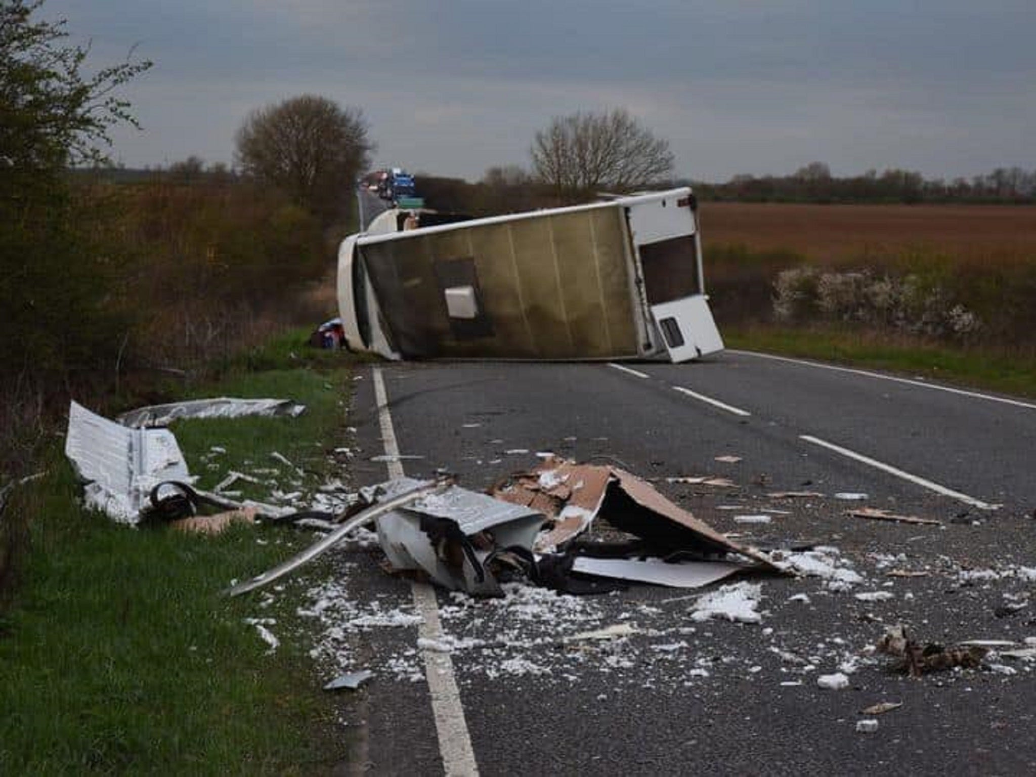 Racehorse Rockwood died in his trainer Karen McLintock's arms after the horsebox he was travelling in was involved in a collision with a van in Lincolnshire.