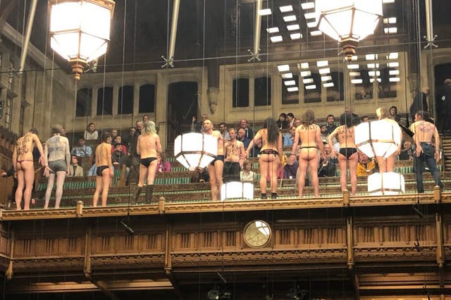 Extinction Rebellion protesters strip in the Commons public gallery to draw attention to climate change