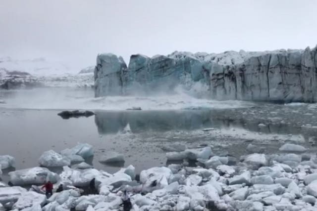 Part of Breiðamerkurjökull glacier broke off and fell into the sea, causing a huge wave to crash towards a group of tourists in Vatnajökull National Park, southeastern Iceland.