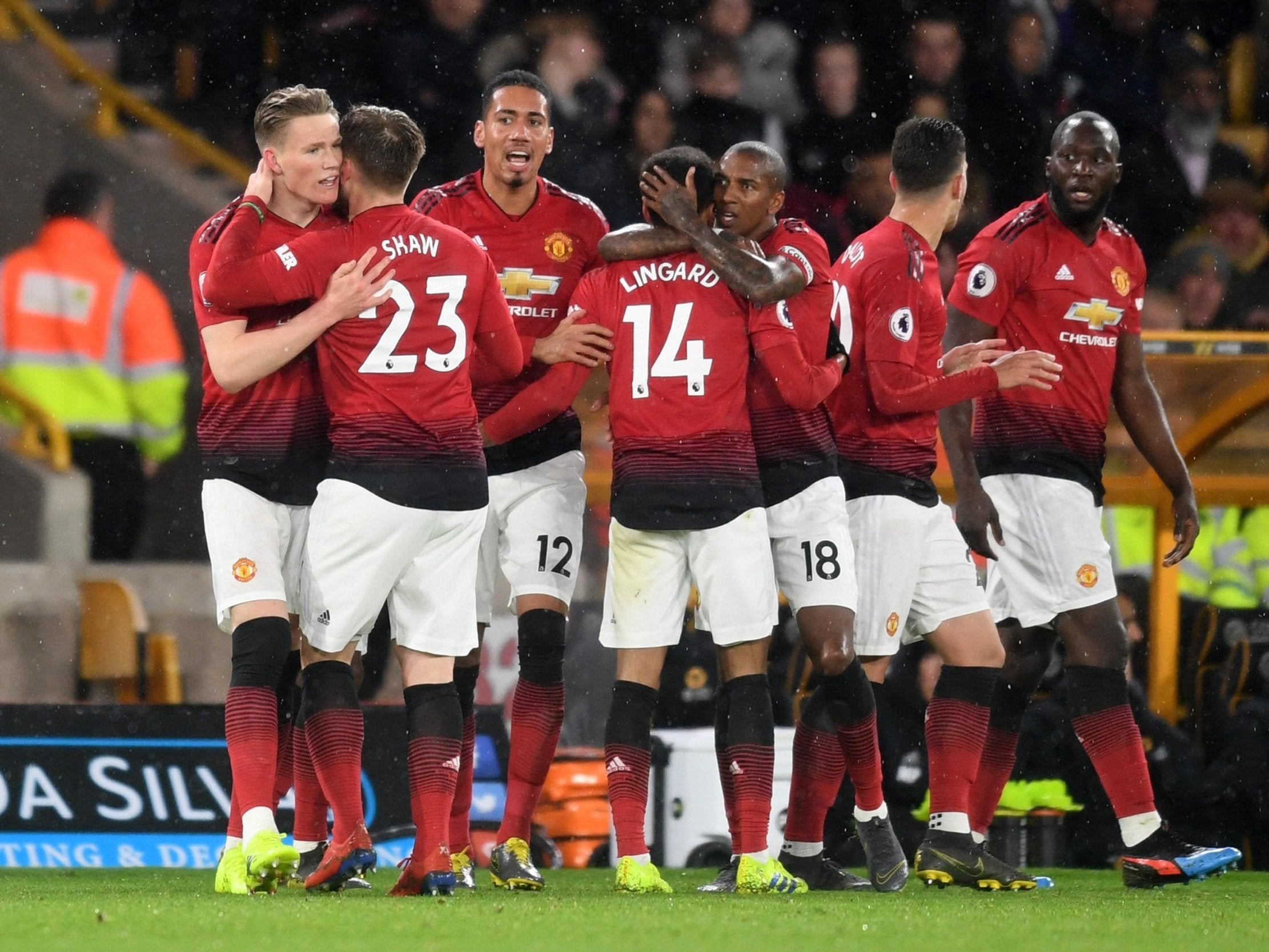 Scott McTominay, left, celebrates with his United team-mates