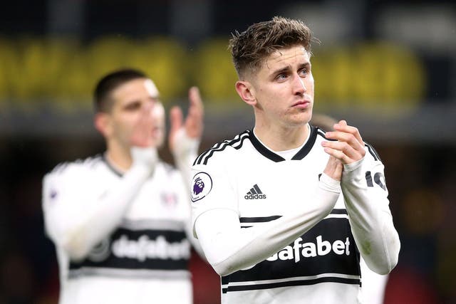 Tom Cairney and Aleksandar Mitrovic applaud the Fulham fans