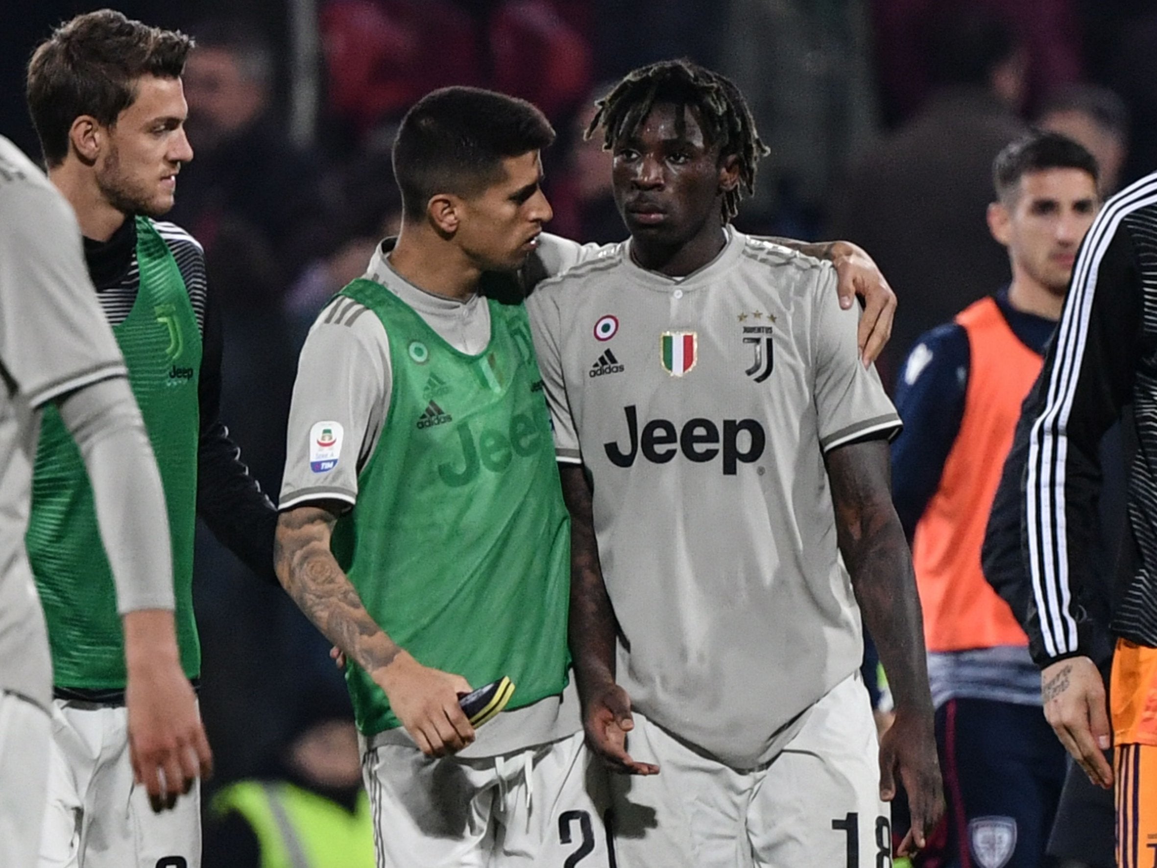 Joao Cancelo comforts Moise Kean after the full-time whistle