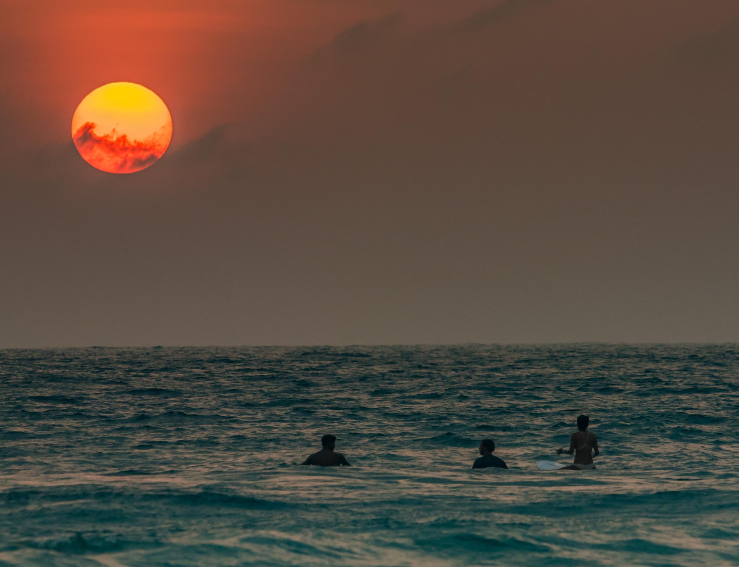 Surfers at Hikkaduwa beach