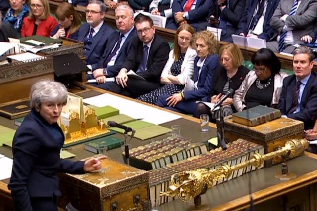 Theresa May speaks during Prime Minister's Questions in the House of Commons yesterday